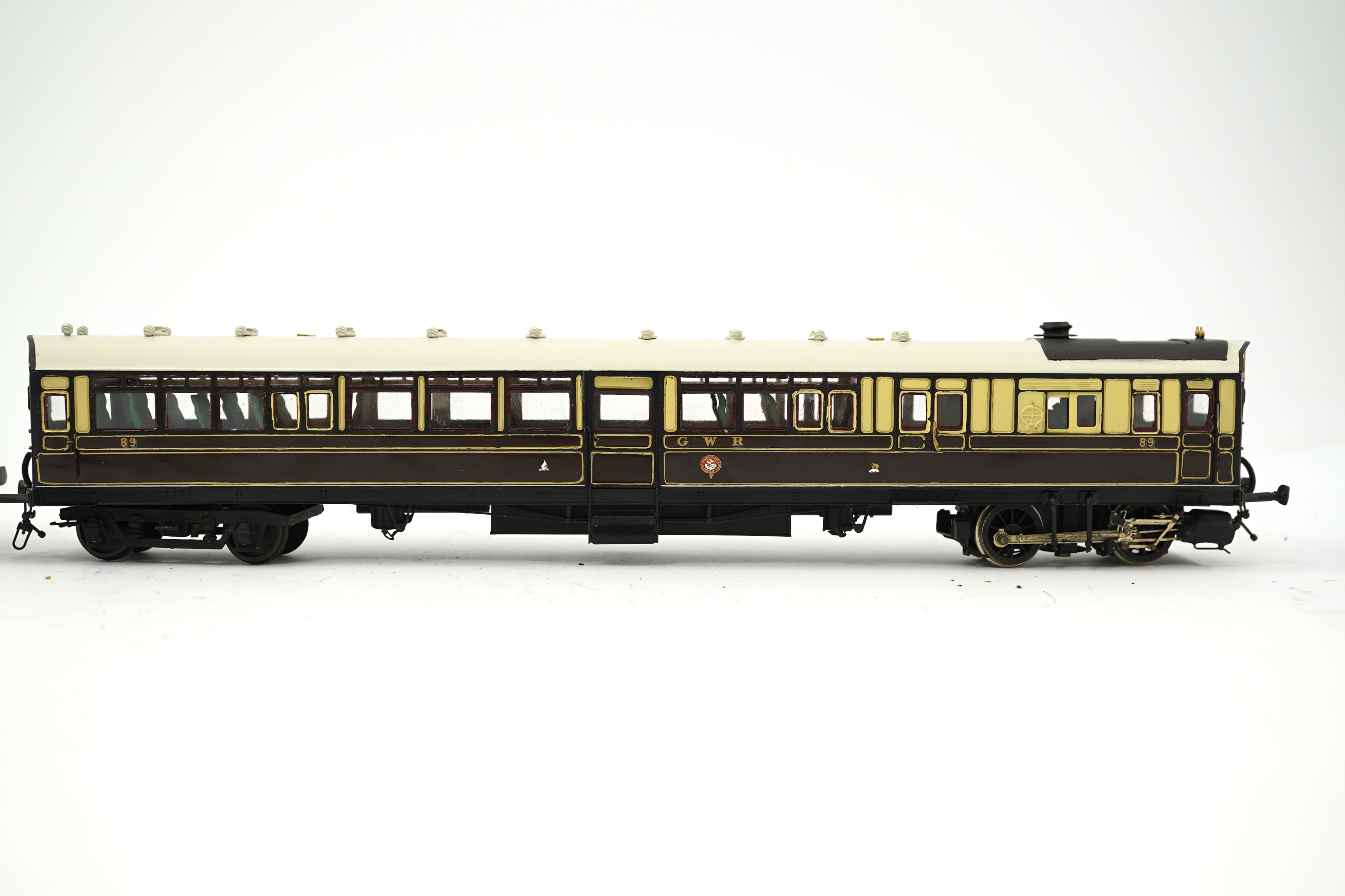 Two 00 gauge plasticard and brass, etc. kit built GWR rail motors; No.74 and No.89, constructed, painted and lined to a high standard, together with a BR turbine electric Co-Co locomotive, 18100, constructed using plasti